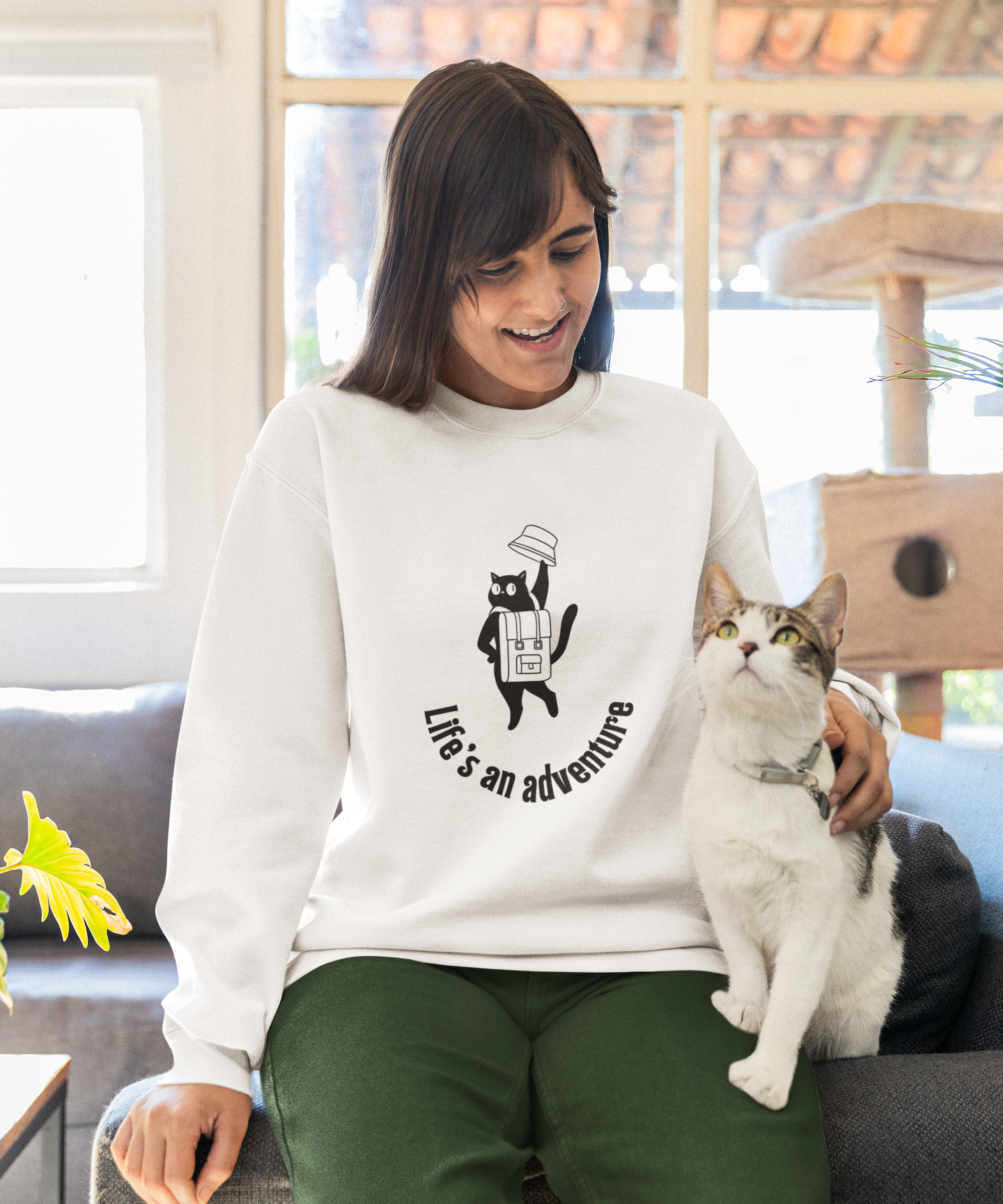 gildan-sweatshirt-mockup-of-a-cheerful-woman-petting-a-cute-kitty-m34784.png