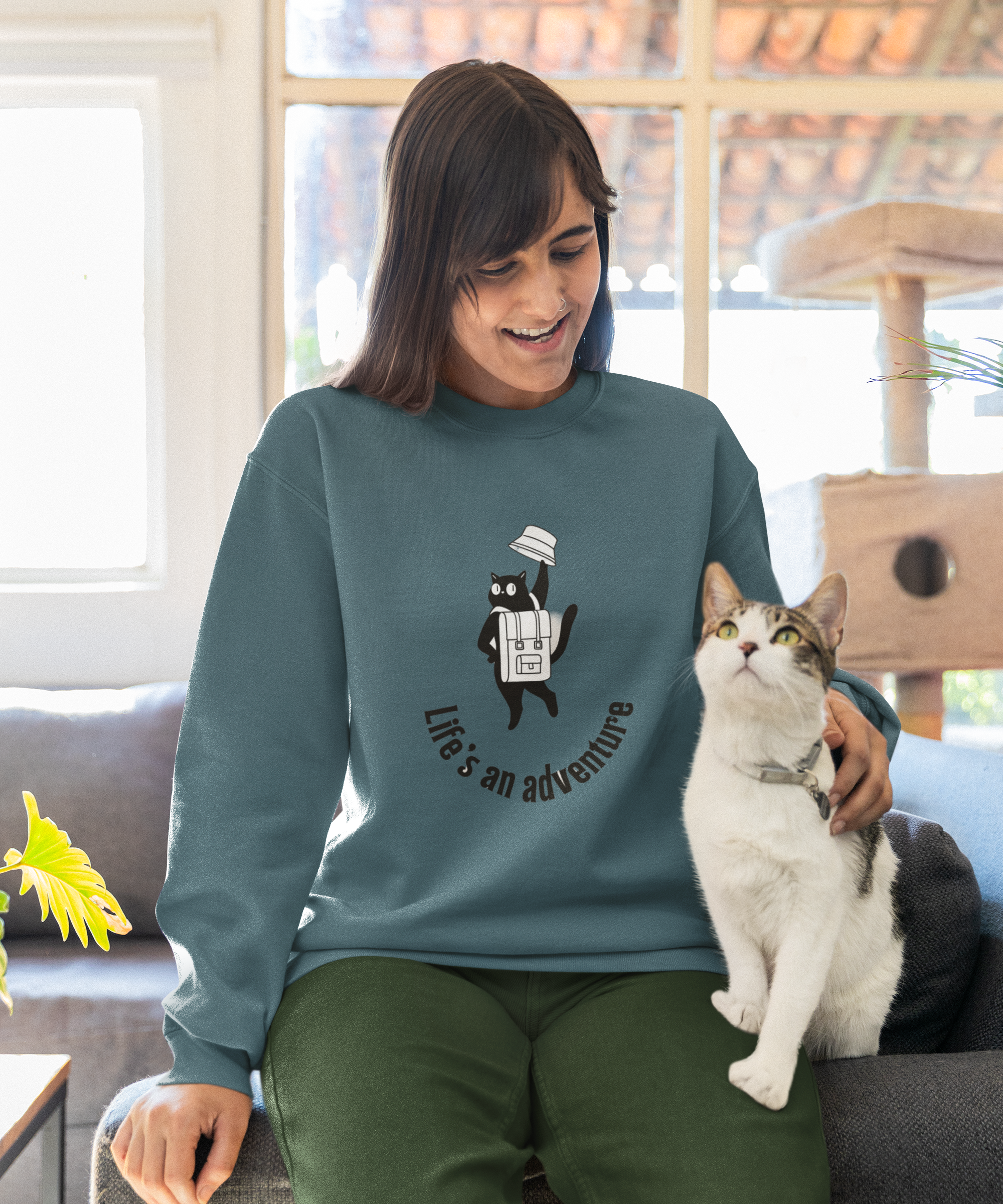 gildan-sweatshirt-mockup-of-a-cheerful-woman-petting-a-cute-kitty-m34784_1.png
